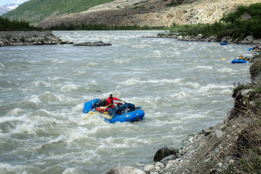 Rafting through rapids on our Alsek River Rafting Expedition.