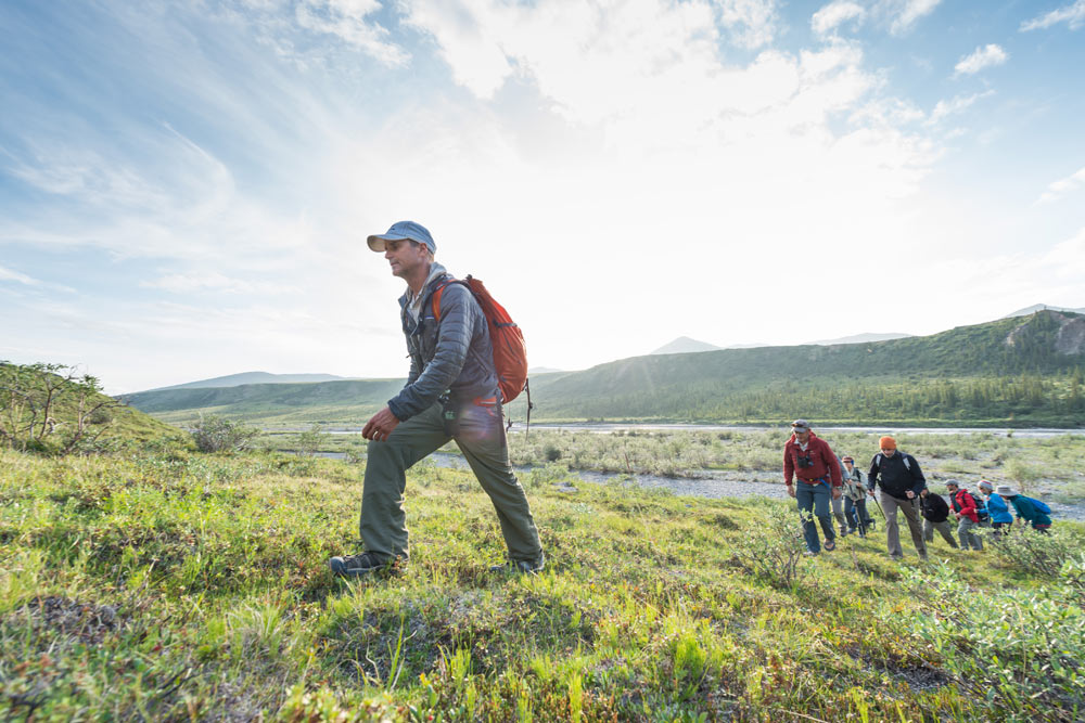 Hikers above the Firth River, Firth River Rafting, Ivvavik National Park, Yukon Territory.