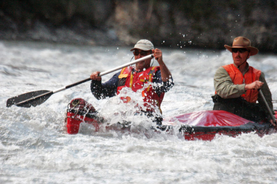 Paddling whitewater rapids on the Nahanni River in Nahanni National Park Preserve.