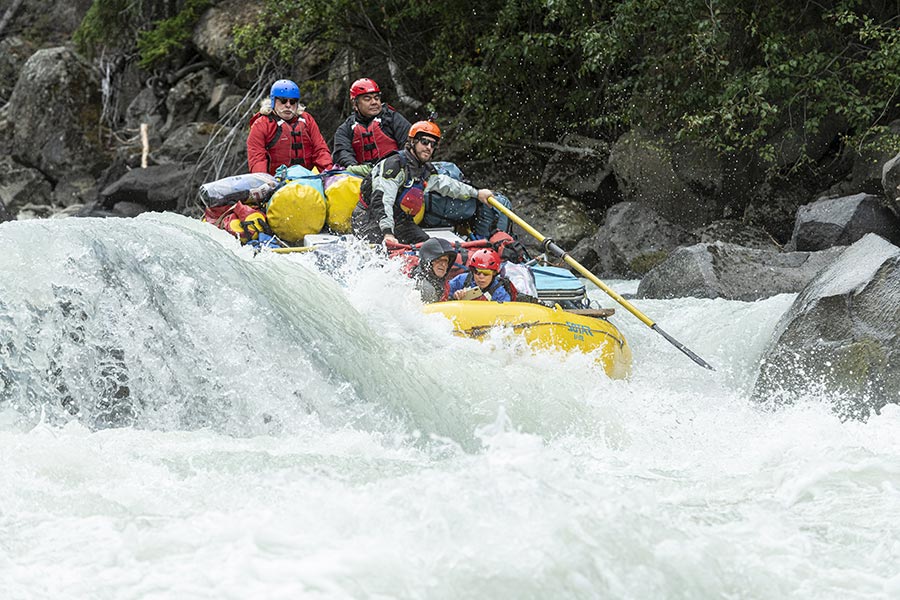 A stable expedition raft speeds through Taseko Falls 