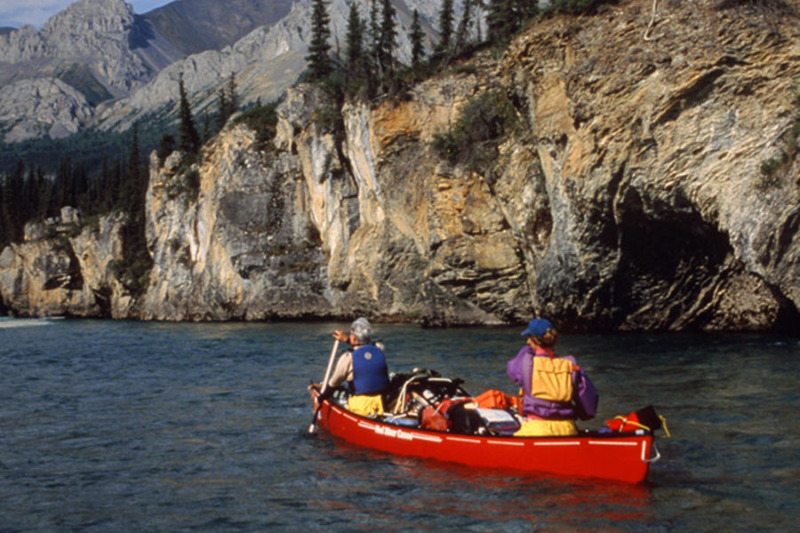 Canoeing the Snake River in Yukon, Canada.