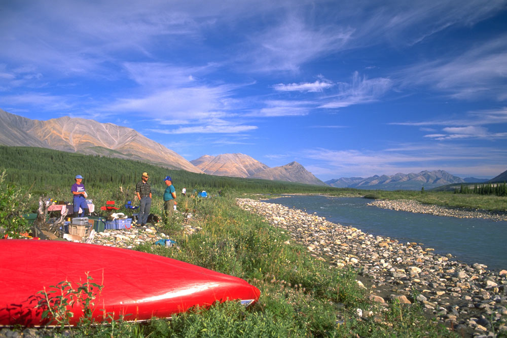 Paddlers having a shore lunch on the Snake River in the Peel Watershed, Yukon, Canada