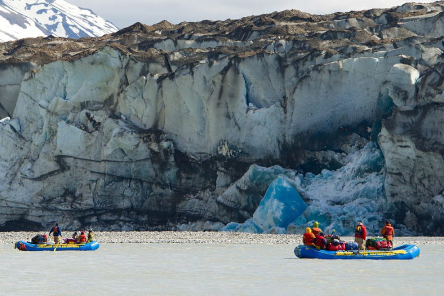 Rafting past a glacier on our Alsek River Rafting Expedition.