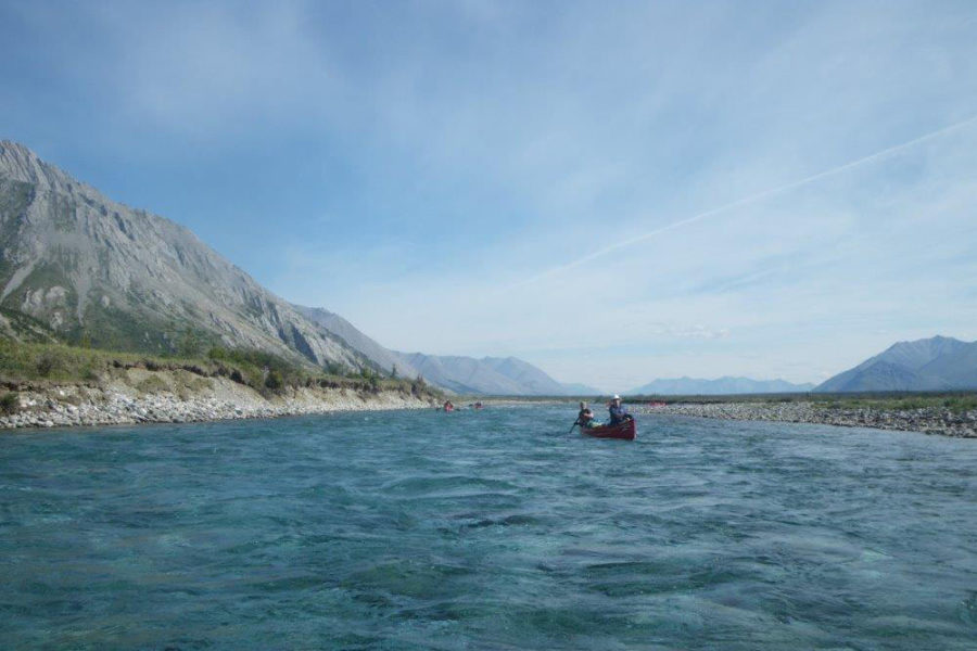 Canoeing the Wind River, Yukon Territory, in the Peel Watershed.