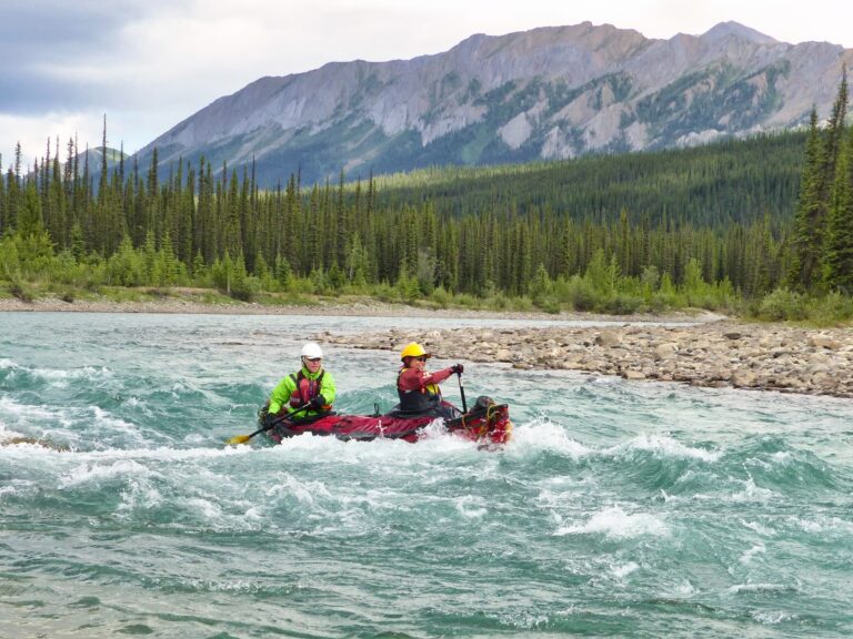 Canoe in rapids on the broken skull river