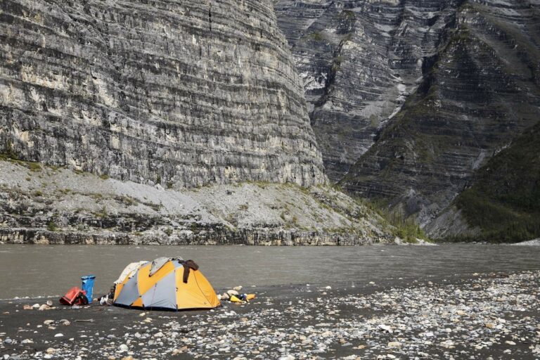 Tent on the shore of the Nahanni River