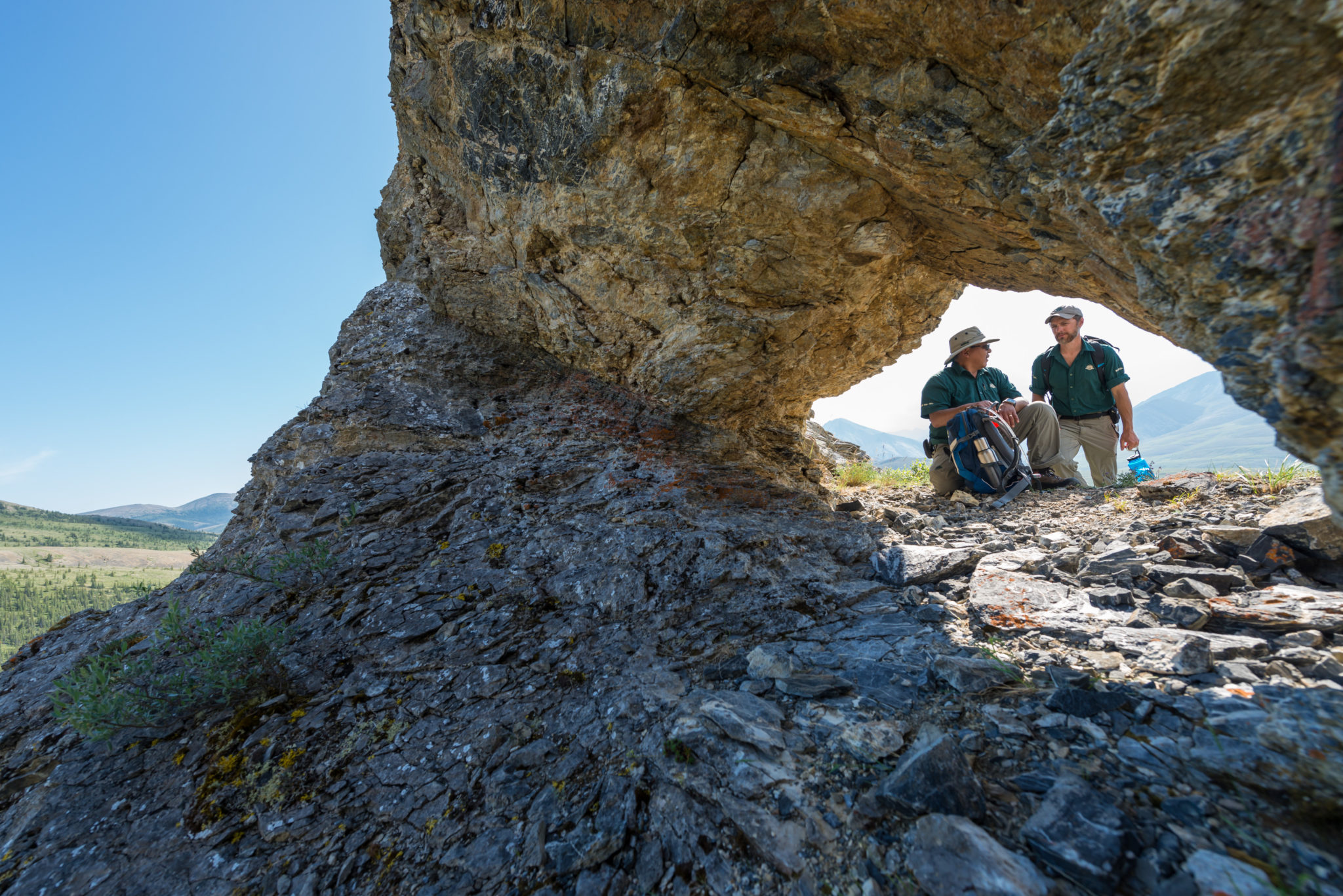 Parks Canada scientists on the Firth River during a hike, Yukon Territory, Canada.